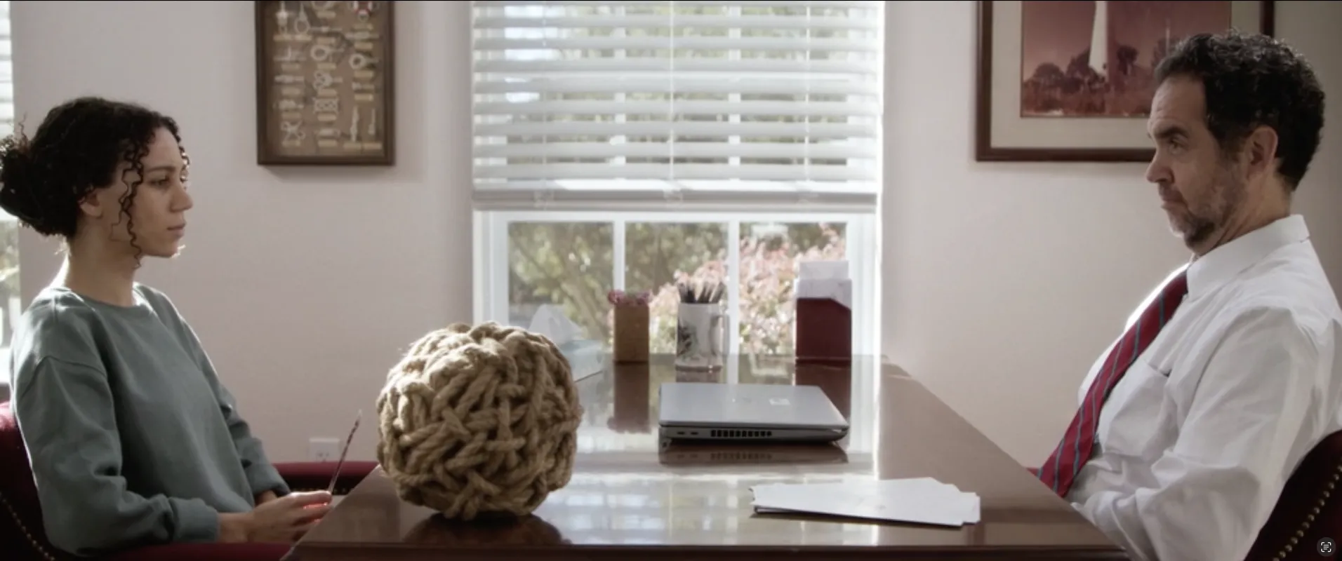 Afterlife still: a consultation across a desk