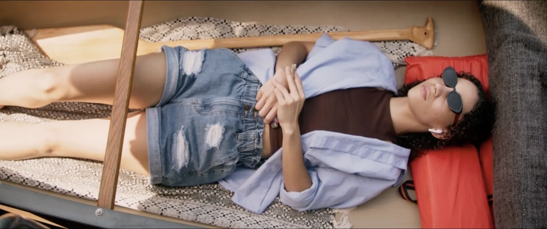 Afterlife still: April from above, resting in the sun