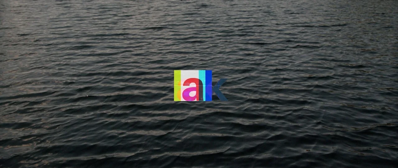 Art Kid Media showreel title frame: the logo over dark water